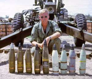 Staff Sgt. Groves with the many shells and fuses used in Vietnam