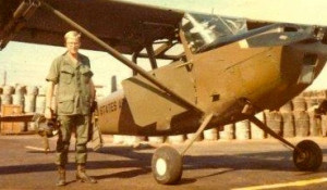 Lt. Domagata beside his Cessna O-1 Birddog Called a Seahorse for its radio handle 